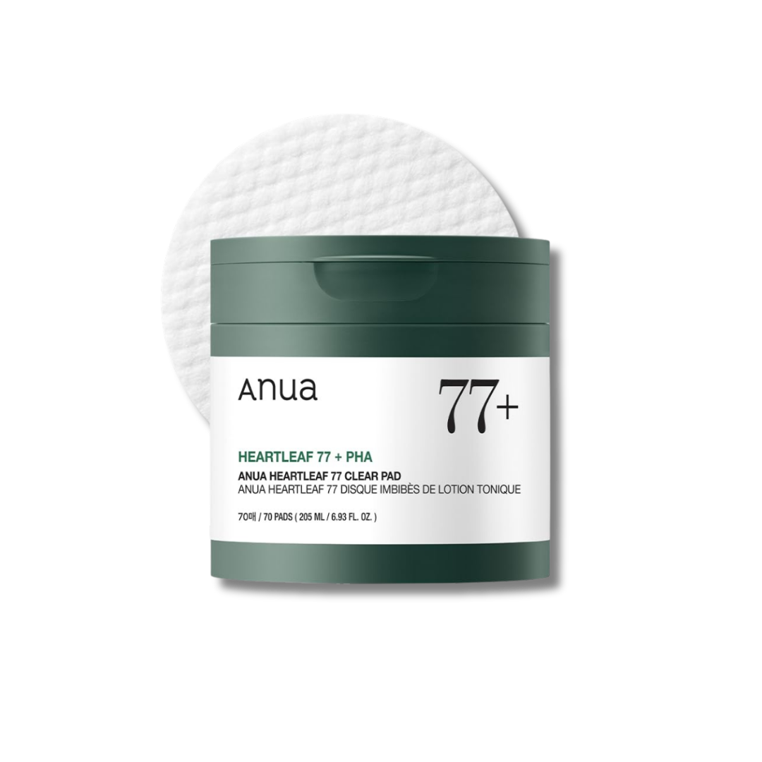 Anua 77+ Heartleaf 77 Clear Pad jar with a dark green lid and white label, shown with a white cotton pad behind it on a light gray background. nicosia, cyprus